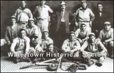 A group of men posing for a photo

Description automatically generated with medium confidence