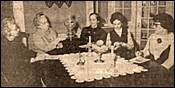 A group of women sitting at a table

Description automatically generated with medium confidence