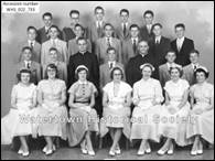 A group of people posing for a photo

Description automatically generated