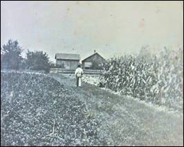 A person walking in a field

Description automatically generated