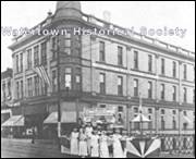 A group of people standing outside a building

Description automatically generated with low confidence