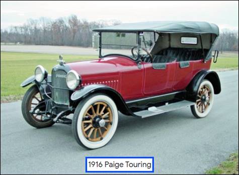 A red car with black top

Description automatically generated