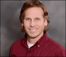 A person in a red shirt

Description automatically generated with medium confidence