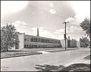 A picture containing text, building, outdoor, road

Description automatically generated