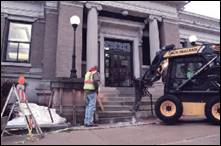 A picture containing building, outdoor, road, street

Description automatically generated